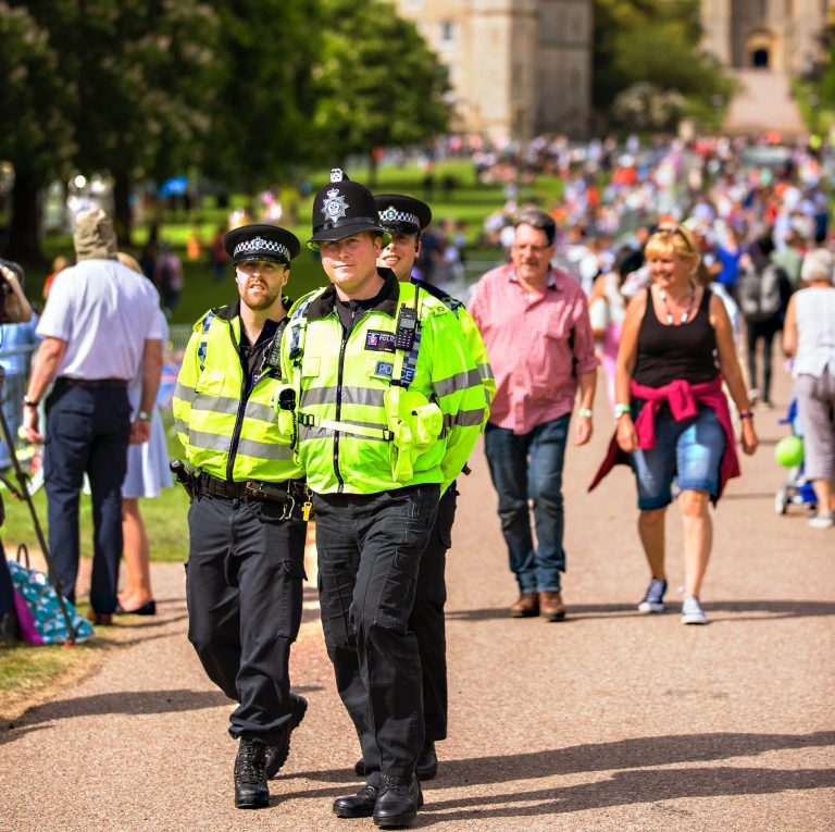 Police patrolling streets, public security and defense workers