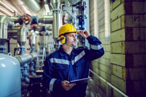 UK industrial worker of manufacturing protected from industrial deafness