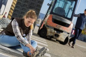 Accidents at work involving moving vehicles like cars and forklift trucks